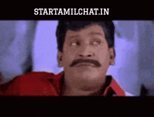 a man with a mustache is making a funny face and the website starttamilchat.in is below him