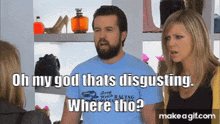 a man with a beard is talking to a woman and says oh my god thats disgusting where tho