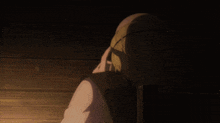 a close up of a person 's face with a shadow on their face