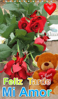 a teddy bear holding a heart that says i love you