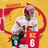 a football player holding a sign that says sea 0 on it