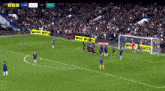 a soccer game is being played with a score of 2-2