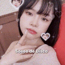 a close up of a woman 's face with the words soseo de disco written on it