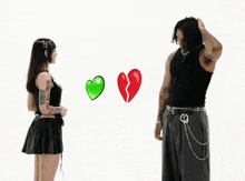 a man and a woman are standing next to each other with a green heart and a broken heart in the background