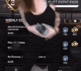 a woman in a black tank top is playing a video game with a weekly challenge