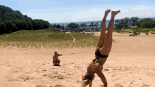 Back Flip Stunt GIF - Back Flip Stunt Beach GIFs