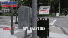 a sign on a pole that says kennedy shanahan