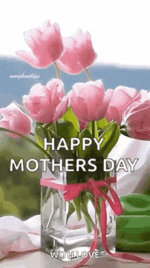 a vase filled with pink flowers with the words `` happy mother 's day with love '' .