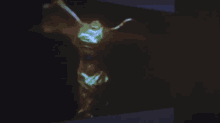 a silhouette of a person is projected on a screen