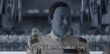 a woman in a white uniform with red eyes says great mothers i salute you .