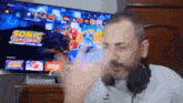 a man wearing headphones is playing sonic racing