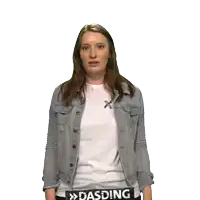 a woman wearing a denim jacket and a white shirt with the word dasding on the bottom