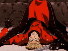 a man in a red jacket is upside down holding a gun