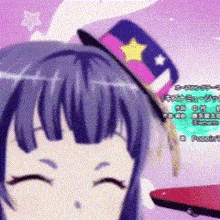 a girl wearing a hat with a star on it is smiling .