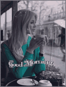 a woman is sitting at a table with a cup of coffee and the words good morning written on the bottom