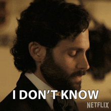 a man in a suit and tie says i don 't know