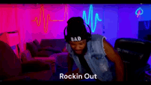 a woman is doing push ups in a living room with a neon heartbeat sign on the wall .
