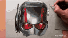 a drawing of an ant man helmet with red eyes