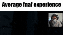 a man wearing headphones and a face mask is playing a video game called fnaf