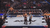 a wrestling match is being shown on a aew channel
