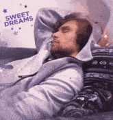 a man in a hoodie is sleeping with the words sweet dreams on the bottom