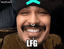 a man with a beard and a nose ring is smiling with the word lfg written on his face