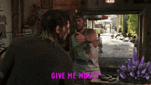 a man in a tank top talks to another man in front of a sign that says exit