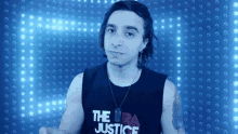 a man wearing a shirt that says the usa justice on it