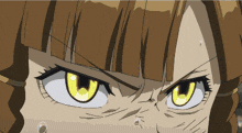 a close up of a girl 's face with a very angry look on her face