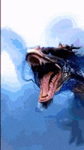 a painting of a monster with its mouth wide open