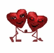 two red hearts with faces on them are hugging each other .