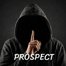 a man in a hooded sweatshirt holds his finger to his lips and the word prospect is below him
