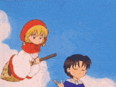 a boy and a girl are flying through the air on a broom .