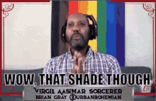a man wearing headphones with the words wow that shade though