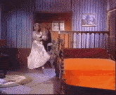 a woman in a white dress is dancing in a room with a bed