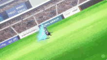 a soccer field with a banner that says ' j.i.t. ' on it