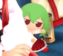 a person is holding a stuffed animal with green hair and sunglasses .