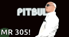 a bald man wearing sunglasses and a white shirt is standing in front of a sign that says pitbull mr 305