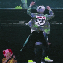 a person wearing a vision street wear jacket