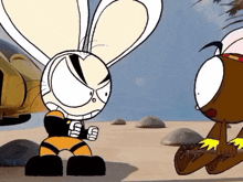 a cartoon rabbit is standing next to another cartoon rabbit on a beach