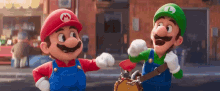 The Super Mario Bros Movie Brothers GIF - The Super Mario Bros Movie Brothers Fist Bump GIFs