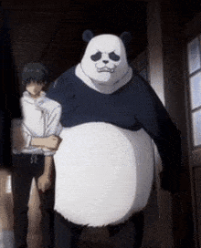a panda bear is standing next to a man in a white shirt .