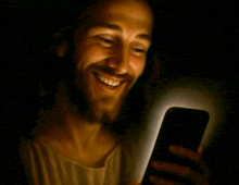 a painting of jesus looking at a cell phone