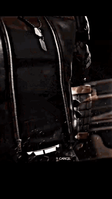 a blurry picture of a man smoking a cigarette with the word death in the lower right corner
