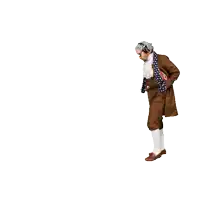 a man in a fancy dress costume is standing with his hands in his pockets against a white background
