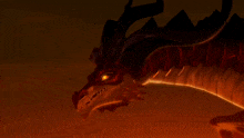 a close up of a dragon 's tail with a flame coming out of it