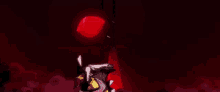 a cartoon character is standing in front of a large red object in the dark .