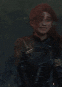 a woman with red hair is wearing armor and smiling