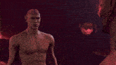 a man without a shirt is standing next to another shirtless man