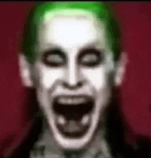 Joker Laugh GIF - Joker Laugh GIFs